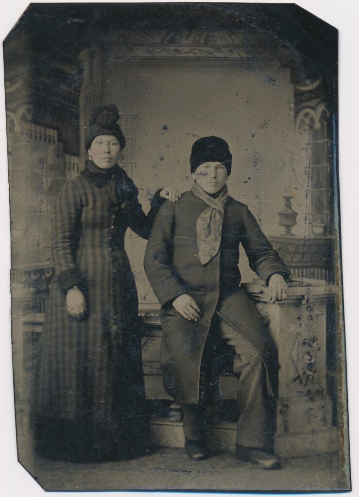 View the photos 1 van Unknown: mother and son in winter clothing, Netherlands ca. 1875